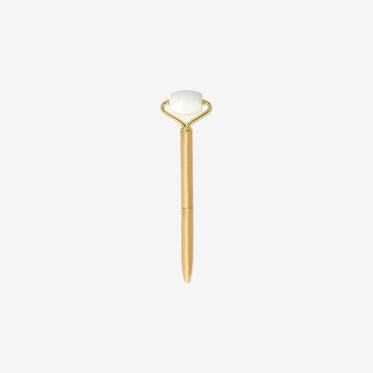 Gold ballpoint pen with facial massager