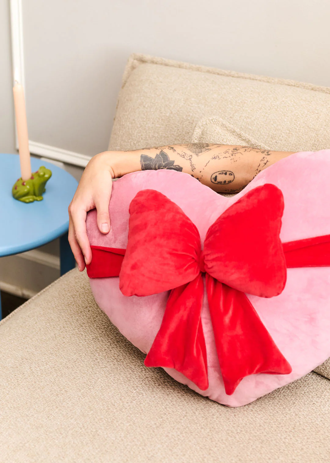 Red heart with bow cushion