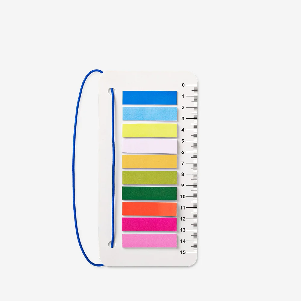 Ruler with elastic and page markers